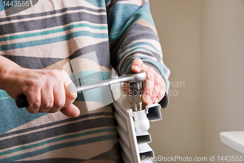 Image of plumber radiator