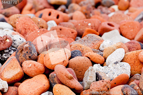 Image of Old worn bricks on beach