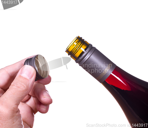 Image of Red wine bottle opened screw top