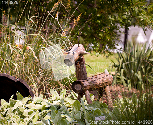 Image of Rustic horse or stag in garden