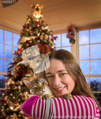 Image of Bengal cat on girls arm