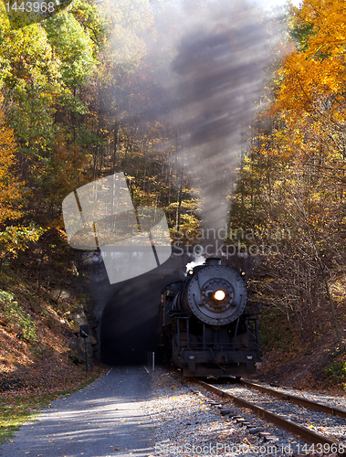 Image of Steam locomotive leaving tunnel