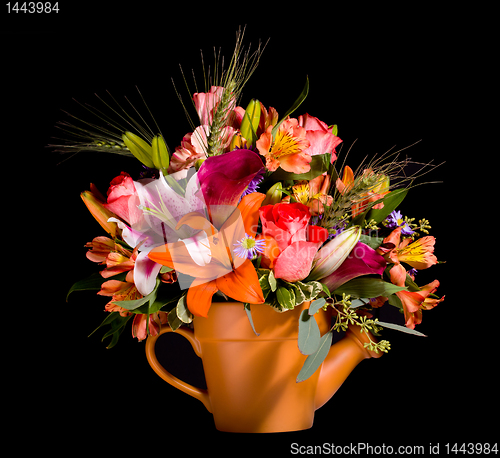 Image of Bouquet of flowers in watering can