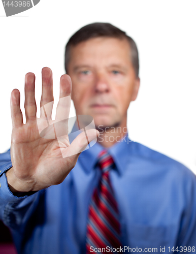 Image of Male executive touches sensor