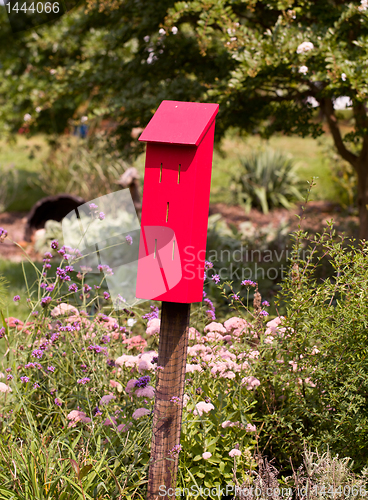 Image of Red bird house for tits