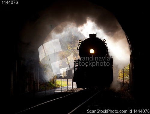 Image of Steam locomotive enters tunnel
