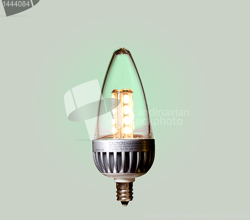 Image of Green ecological LED bulb with path