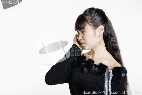 Image of Annoyed woman on phone 