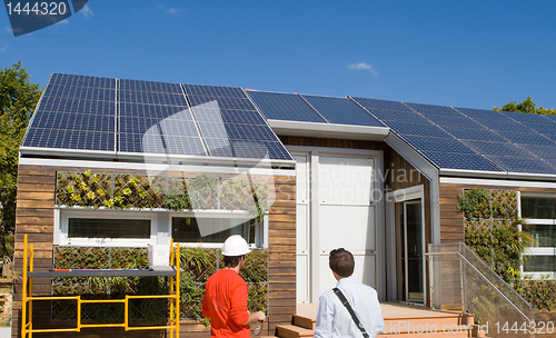 Image of Solar Construction Work House Two Men Hard Hat Home Scaffolding