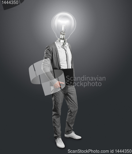 Image of lamp head businessman with laptop