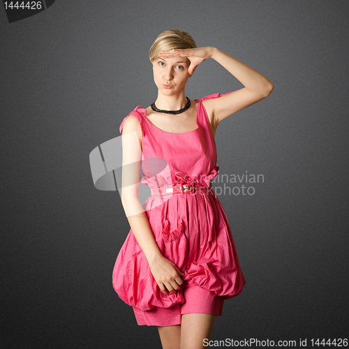 Image of sexy female stewardess in pink