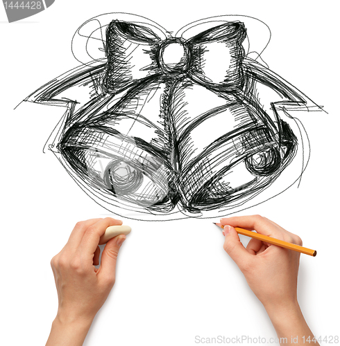 Image of sketch christmas bells with human hands