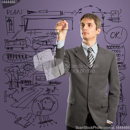 Image of businessman writing something