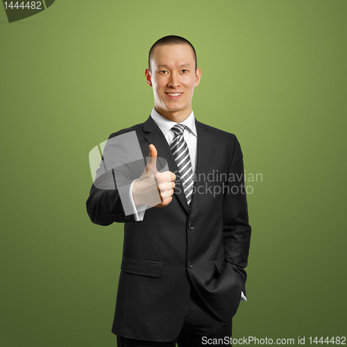 Image of asian businessman in black suit shows well done