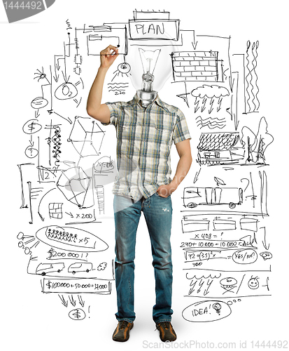 Image of asian male with lamp writting something