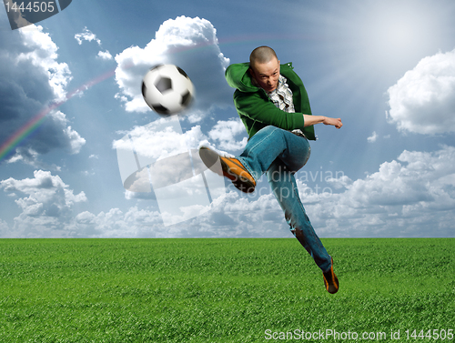 Image of asian soccer player outdoors