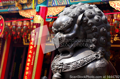 Image of Bronze lion in chinese temple