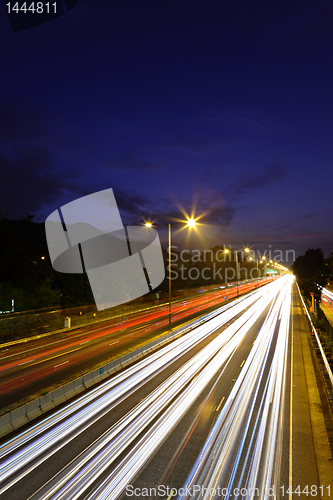 Image of traffic on highway at night