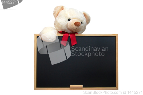 Image of teddy with empty blackboard