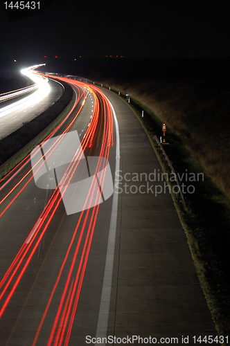 Image of highway at night with traffic