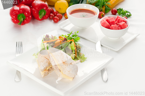 Image of tuna and cheese sandwich with salad