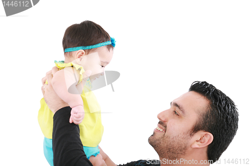 Image of Baby and father are playing. The baby 8 month old. Isolated on a