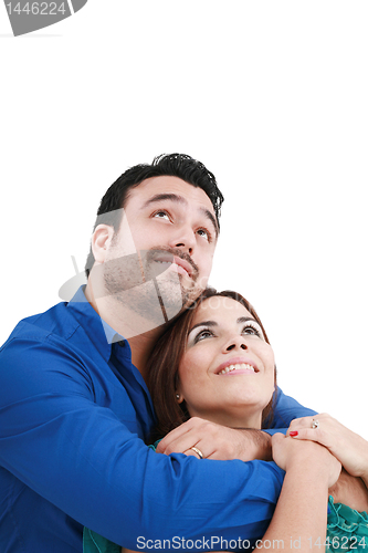 Image of Closeup portrait of a happy  couple looking at something interes