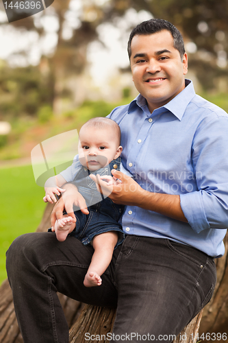 Image of Handsome Hispanic Father and Son Posing for A Portrait