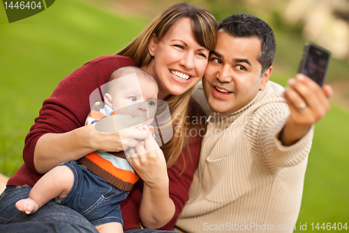 Image of Happy Mixed Race Parents and Baby Boy Taking Self Portraits