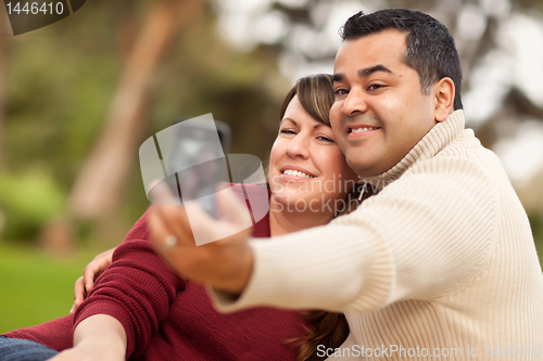 Image of Attractive Mixed Race Couple Taking Self Portraits