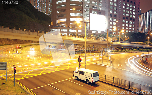 Image of traffic in modern city at night