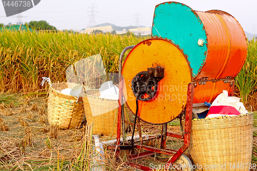 Image of Vintage rice wood machine 