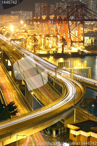 Image of Overpass at night through the port