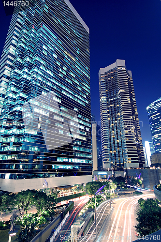 Image of Tall office buildings by night 