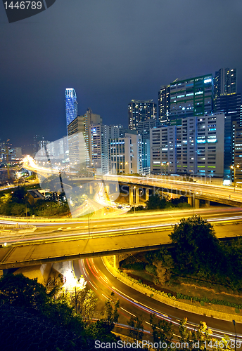 Image of Colorful city night with buildings and bridge