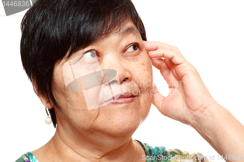 Image of asian woman looking at right