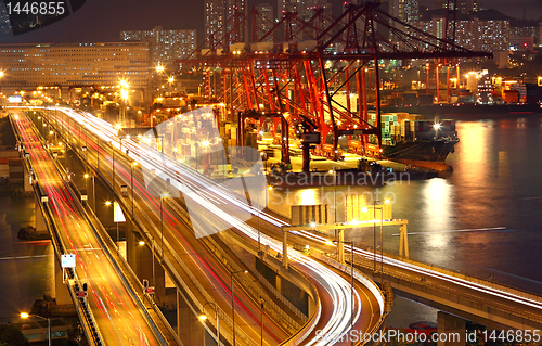 Image of Overpass at night through the port