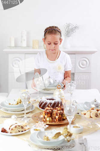 Image of Girl setting table