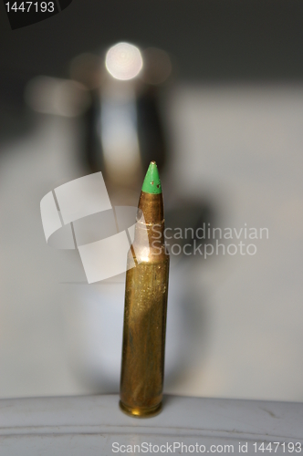 Image of A bullet on a table