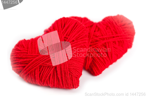 Image of two red thread hearts