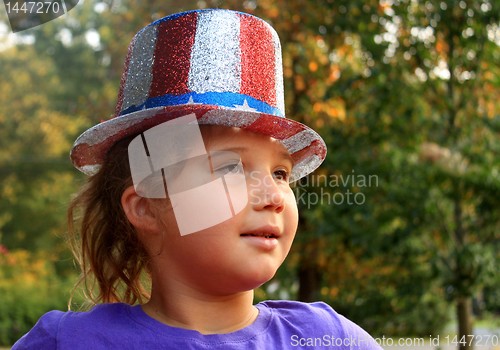 Image of Little girl in 4t of july hat