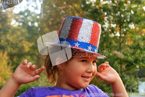 Image of Little girl in 4t of july hat