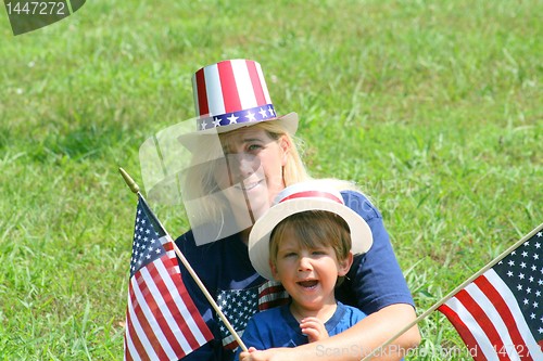 Image of Young mother and son at 4th of July