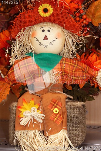 Image of Halloween scarecrow sitting