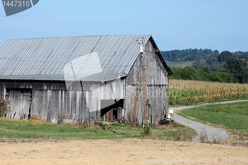 Image of Old barn with winding country road