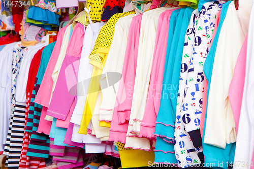 Image of a lot of clothes on a hanger