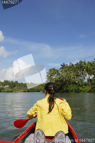 Image of Woman in Canoe