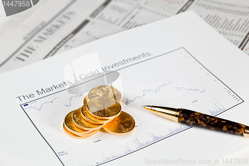 Image of Golden Eagle coins on newspaper