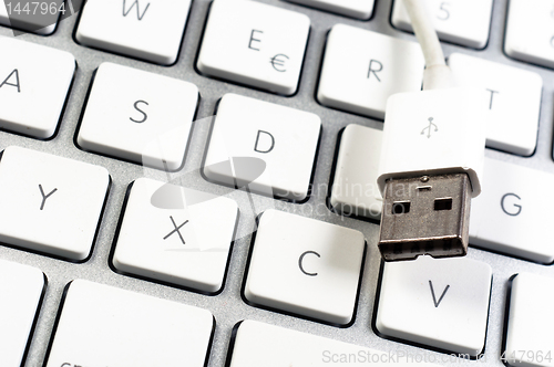 Image of Closeup of a white clean keyboard with USB