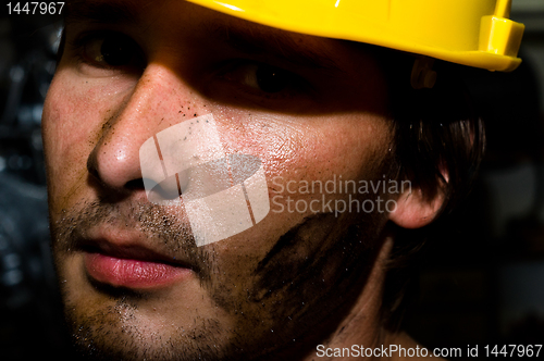 Image of Tired industrial worker